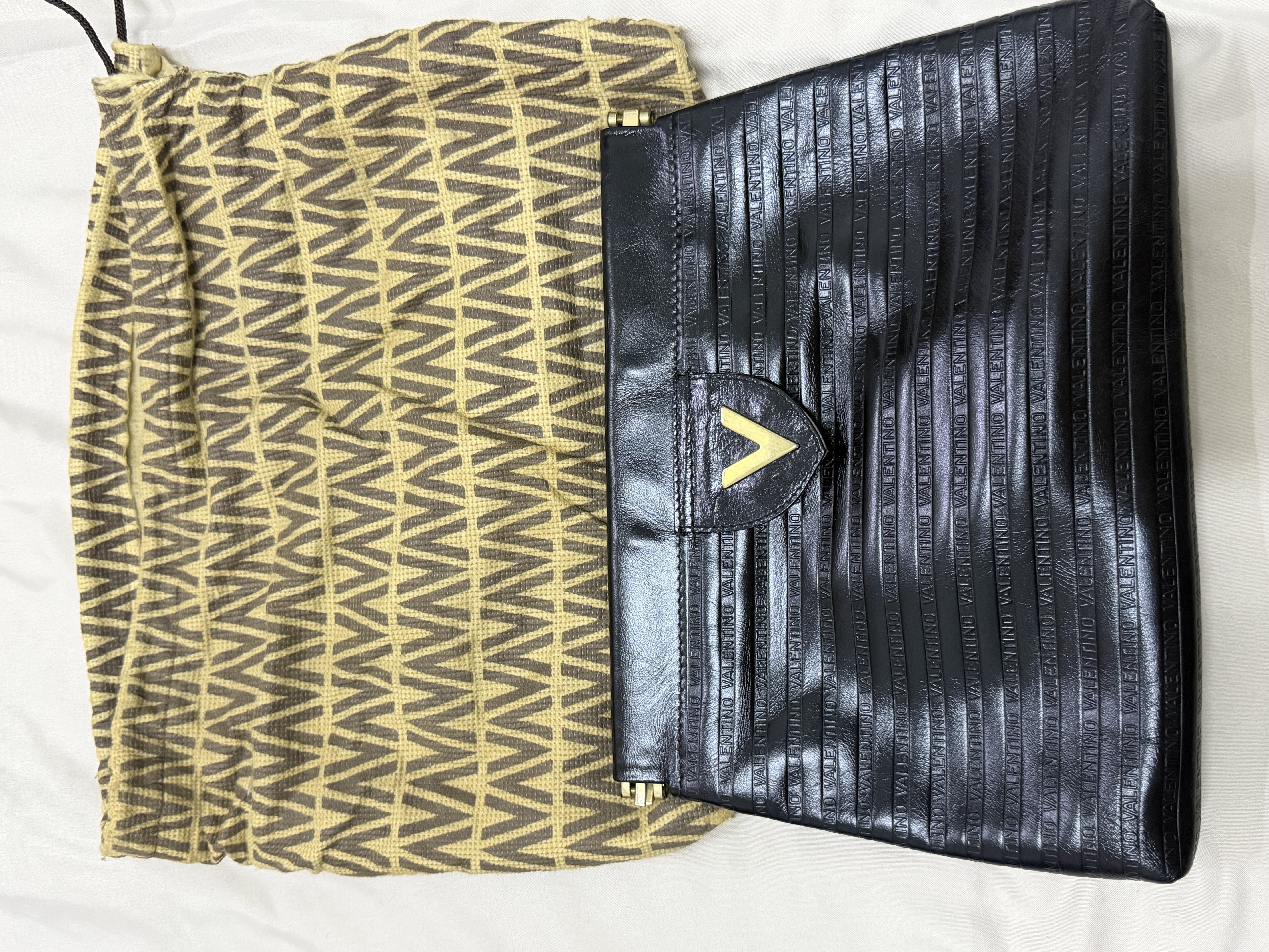 Valentino — Valentino Black Embossed Logo Clutch Bag (Good)